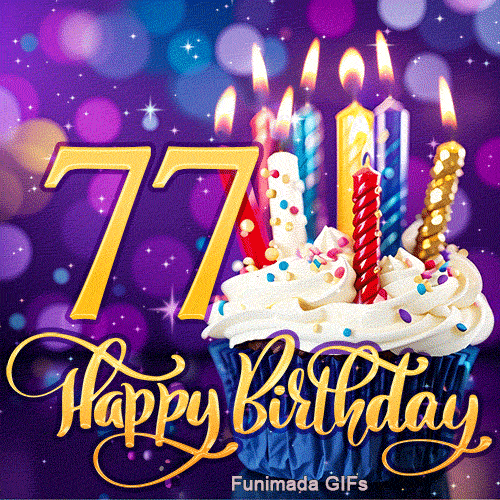 Golden number 77 and Happy Birthday script with a frosted cupcake topped with lit candles on a glowing, blurry purple lighted background.