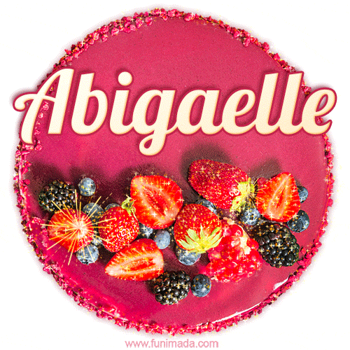 Beautifully decorated red velvet berry birthday cake with vibrant fruits and a glowing 'Abigaelle' name, adding a touch of sweetness and sparkle.