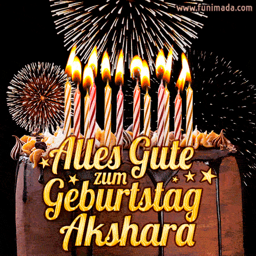 A chocolate birthday cake with glowing candles, the German text 'Alles Gute zum Geburtstag Akshara,' and vibrant fireworks lighting up the background in an animated GIF.