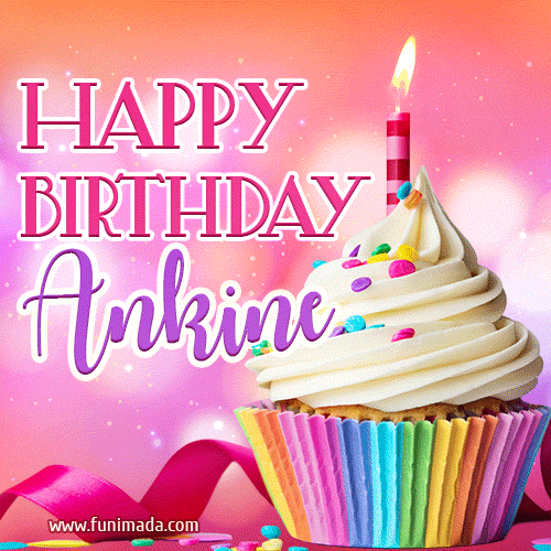 A vibrant birthday GIF featuring a rainbow-colored cupcake topped with white frosting, sprinkles, and a lit candle. The text reads 'Happy Birthday Ankine' in bold pink and violet letters with white outline.