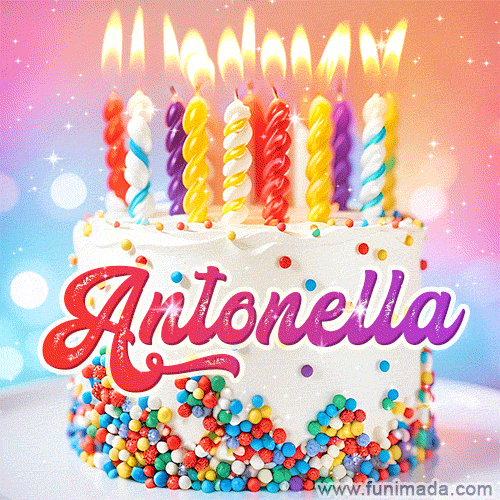 A cheerful white birthday cake with multicolor sprinkles, lit candles, and 'Antonella' written in vibrant letters, in an animated GIF.