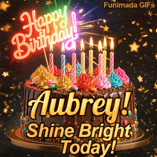 Yellow script spelling the name Aubrey! on a classic chocolate cake under a glowing pink neon Happy Birthday sign.