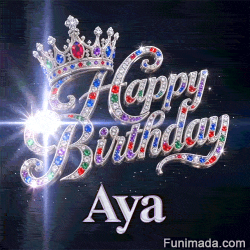 White lens flare effect glowing from crystal-encrusted cursive letters spelling Happy Birthday on a dark starry background.Aya