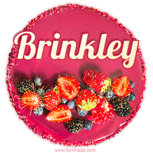 Beautifully decorated red velvet berry birthday cake with vibrant fruits and a glowing 'Brinkley' name, adding a touch of sweetness and sparkle.
