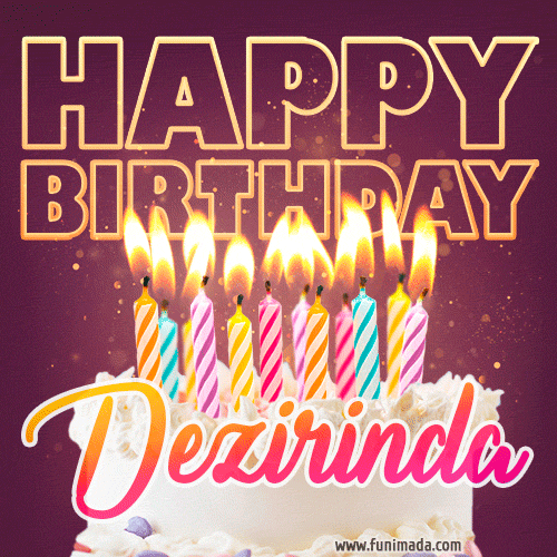 A colorful birthday cake topped with lit candles, with the words 'Happy Birthday Dezirinda' in bold glowing letters on a burgundy background. Animated flames add a festive touch.