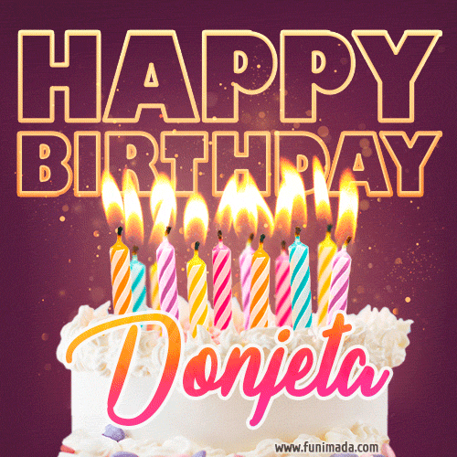 A colorful birthday cake topped with lit candles, with the words 'Happy Birthday Donjeta' in bold glowing letters on a burgundy background. Animated flames add a festive touch.