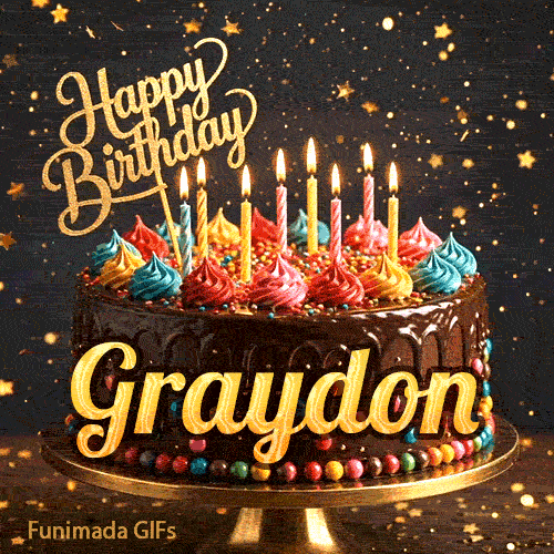 Gold Happy Birthday topper and bright burning candles on a chocolate frosted cake with the name Graydon.