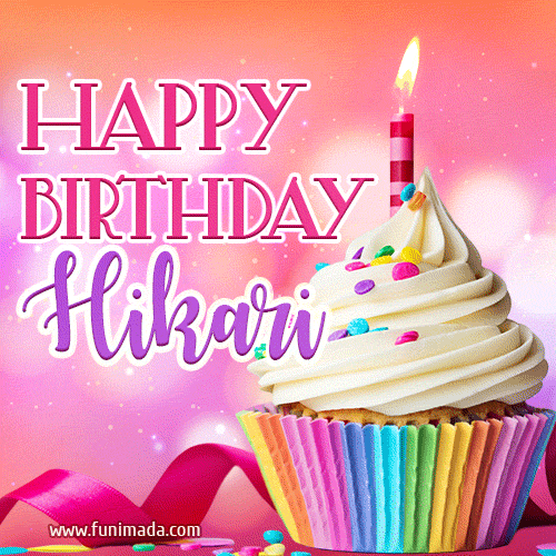 A vibrant birthday GIF featuring a rainbow-colored cupcake topped with white frosting, sprinkles, and a lit candle. The text reads 'Happy Birthday Hikari' in bold pink and violet letters with white outline.