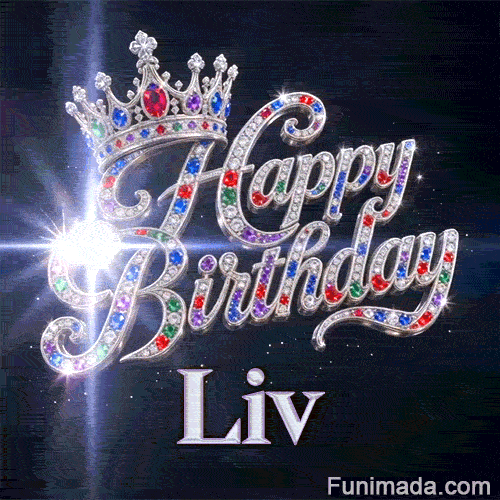 Close-up of a silver crown with emeralds, rubies, and sapphires resting on crystal-encrusted Happy Birthday text.Liv