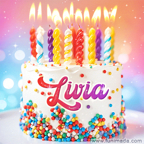 Personalized for Livia elegant birthday cake adorned with rainbow sprinkles, colorful candles and glitter