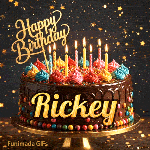 A decorated birthday cake with colorful frosting rosettes, glowing candles, and a golden Happy Birthday topper with the name Rickey.