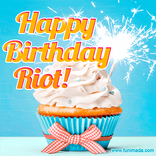 Happy Birthday, Riot! Elegant cupcake with a sparkler.