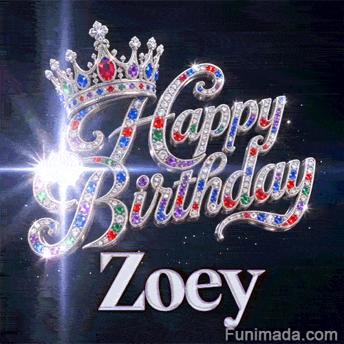 Close-up of a silver crown with emeralds, rubies, and sapphires resting on crystal-encrusted Happy Birthday text.Zoey