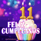 GIF animado de un cupcake decorado con confites, dos velas doradas encendidas formando el número 11, sobre un fondo púrpura brillante con destellos.