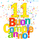 Animazione con il numero 11 in giallo e scritte multicolore 'Buon Compleanno!', accompagnate da una pioggia di stelle e coriandoli colorati.
