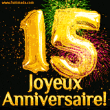 GIF animé pour un 15e anniversaire avec des ballons dorés en forme de 15, des feux d'artifice colorés et le texte 'Joyeux Anniversaire!' sur un fond noir festif.