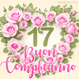 GIF per il 17° compleanno con un cuore di rose rosa e scritta elegante