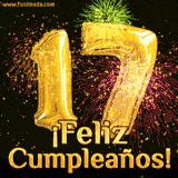 GIF animado con globos dorados en forma del número 17, acompañado de fuegos artificiales de colores y la frase '¡Feliz cumpleaños!' en letras vibrantes.