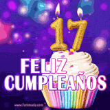 GIF animado de un cupcake decorado con confites, dos velas doradas encendidas formando el número 17, sobre un fondo púrpura brillante con destellos.