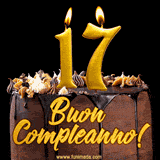 GIF animato con una torta al cioccolato decorata con crema, dettagli dorati e due candele accese che formano il numero 17. Messaggio 'Buon Compleanno' in scritta elegante.