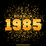 A sparkling black and gold animation with bold golden text reading 'Born in 1985,' surrounded by shimmering confetti.