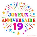 GIF animé joyeux anniversaire 19 ans avec étoiles multicolores et feu d’artifice