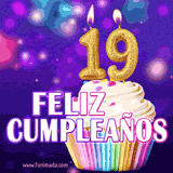 GIF animado de un cupcake decorado con confites, dos velas doradas encendidas formando el número 19, sobre un fondo púrpura brillante con destellos.
