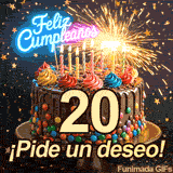Un bizcocho de chocolate resalta con la cifra 20. Chispas saltan de una bengala encendida, acompañadas del mensaje ¡Pide un deseo! y confeti dorado.