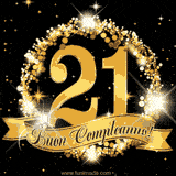 Il numero 21 è circondato da un anello dorato brillante, accompagnato da un nastro elegante con la scritta 'Buon Compleanno!' su uno sfondo scuro.