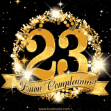 Il numero 23 è circondato da un anello dorato brillante, accompagnato da un nastro elegante con la scritta 'Buon Compleanno!' su uno sfondo scuro.