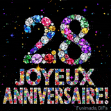 Le chiffre 28 et les mots Joyeux Anniversaire en cristaux colorés brillants, se détachant sur un fond noir rempli de petites étoiles animées.