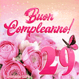 GIF dei 29 anni che mostra rose rosa in fiore, farfalla rosa e scritte di buon compleanno tra riflessi luminosi e polvere di stelle.