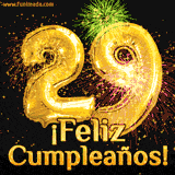 GIF animado con globos dorados en forma del número 29, acompañado de fuegos artificiales de colores y la frase '¡Feliz cumpleaños!' en letras vibrantes.