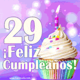 Animación de un cupcake con cobertura blanca, confites de colores, una vela encendida y el número 29 en grande sobre un fondo púrpura con luces brillantes.