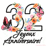 Ce GIF de Joyeux 32ème Anniversaire présente le nombre vingt rempli d'un bouquet vibrant de fleurs animées, avec des papillons qui bougent doucement sur un fond blanc.