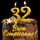 GIF animato con una torta al cioccolato decorata con crema, dettagli dorati e due candele accese che formano il numero 32. Messaggio 'Buon Compleanno' in scritta elegante.