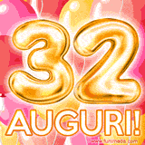 Bouquet animato di palloncini multicolori che emergono da una scatola regalo, con il numero 32 e la scritta 'Tanti Auguri!' su uno sfondo pieno di coriandoli.