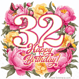 A celebratory GIF image features the animated number '32' and the words 'Happy Birthday!' surrounded by pink and yellow flowers. Two moving butterflies are included in this festive design.