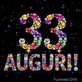 Il numero 33 e la scritta Auguri formati da gemme colorate e scintillanti su uno sfondo nero animato da piccole stelle luminose.
