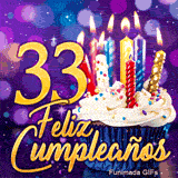 GIF festivo de 33 años mostrando el número 33 en oro brillante, un pastelito iluminado y velas de colores.
