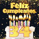 GIF animado de un pastel decorado con velas de colores, con el número 34 resaltado y un fondo brillante que transmite celebración.