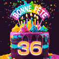 Gâteau au chocolat avec le numéro 36 orné d'un glaçage vibrant, de bougies et d'une décoration arc-en-ciel