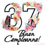 Questo GIF di Buon 37° Compleanno mostra il numero venti riempito con un vibrante bouquet di fiori animati, con farfalle che si muovono dolcemente su uno sfondo bianco.
