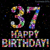 A black background showing the number 37 and Happy Birthday text, both shaped by sparkling multi-colored diamonds surrounded by tiny shining colored sparks.