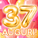 Bouquet animato di palloncini multicolori che emergono da una scatola regalo, con il numero 37 e la scritta 'Tanti Auguri!' su uno sfondo pieno di coriandoli.