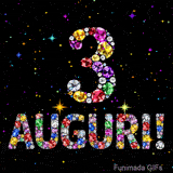 Immagine animata che mostra il numero 3 e il testo Auguri composti da pietre preziose colorate, con un effetto scintillante su sfondo nero.