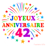 GIF animé joyeux anniversaire 42 ans avec étoiles multicolores et feu d’artifice