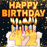 Happy 42nd birthday card featuring a white frosted cake adorned with colorful, striped candles, and golden text with glitter on a black backdrop.
