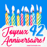 GIF animé joyeux anniversaire pour 42 ans avec des bougies colorées allumées, un fond bleu vif et le texte 'Joyeux Anniversaire 42!' en écriture élégante.