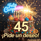 Tarta festiva con el gran número 45 destacado. Chispas intensas y confeti estrellado enmarcan perfectamente las palabras ¡Pide un deseo!.